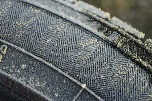 Hoarfrost on a rubber tire wheel photo