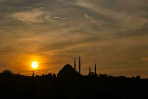 Suleymaniye Mosque at sunset. Istanbul silhouette. Ramadan or islamic concept photo