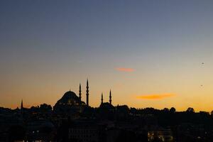 Istanbul silhouette. Islamic or Ramadan concept photo. Suleymaniye Mosque photo
