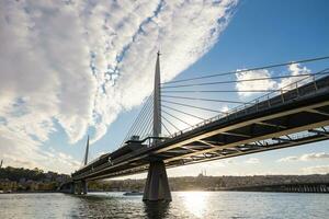 Halic Metro Bridge in Istanbul. Public transportation system of Istanbul photo