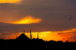 Ramadan or islamic concept photo. Silhouette of Suleymaniye Mosque photo