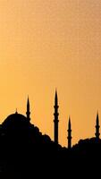 Silhouette of Suleymaniye Mosque at sunset. Islamic concept image. photo