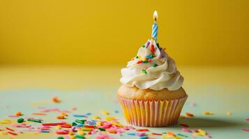 AI generated Birthday Cupcake with Candle on Yellow Pastel Background photo