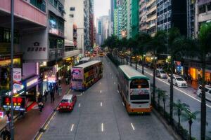 Hong Kong,March 26,2019-Daily life in the streets and skyscrapers of Hong Kong during a cloudy day photo