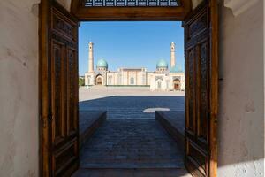 Tashkent, Uzbekistan-august 11, 2023-view of the entrance of the Tillya Sheikh Mosque  during a sunny day.The complex is a square that includes a set of religious buildings in Tashkent photo