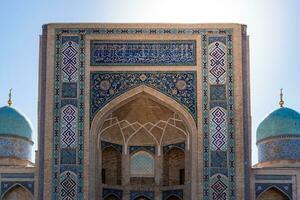 Tashkent, Uzbekistan-august 11, 2023-view of the entrance of the Tillya Sheikh Mosque  during a sunny day.The complex is a square that includes a set of religious buildings in Tashkent photo