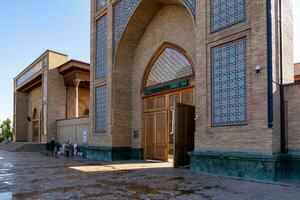 Tashkent, Uzbekistan-august 11, 2023-Khazrati Imam Mosque in the Hazrati Imam complex during a sunny day.The complex is a square that includes a set of religious buildings in Tashkent photo
