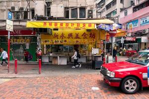 Hong Kong,March 26,2019-Daily life in the streets and skyscrapers of Hong Kong during a cloudy day photo