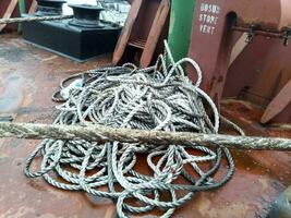 Rope ladder on the ship. Rope and wood photo