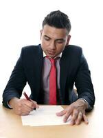 young man signing contract photo