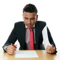 young businessman with paperwork photo