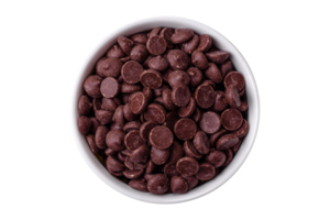 Round granules of sweet confectionery chocolate as an ingredient for preparing desserts png