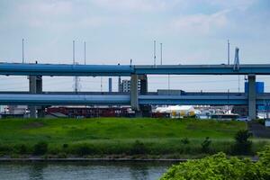 A traffic jam at the downtown street and highway telephoto shot photo