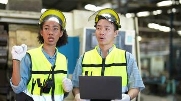 Factory engineer workers checking and adjusting machine panel. In the Background Unfocused Large Industrial Factory. Portrait Heavy Industry Worker man. Quality assurance for manufacturing industry. video