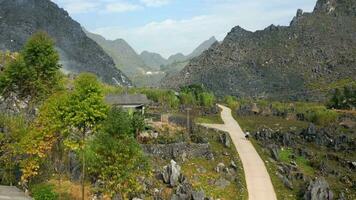 Woman Walking through Mountain Ethnic Village on the Ha Giang Loop North Vietnam video