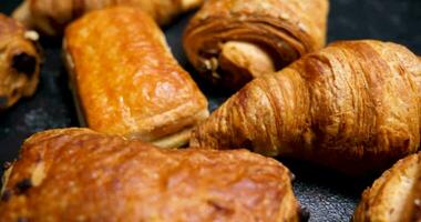 A selection of golden crust pastry. Revealing a mix of sweet pastry placed close to each other. video