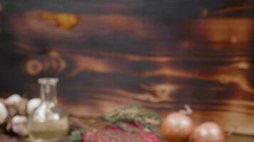 Beautiful composition of raw meat and vegetables on a dark wooden background. Wooden vintage style surface. video