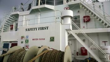 View of the ship's bridge. Two floors on the deck of the ship. Stairs and transitions. The rope is mooring photo