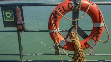 Means of helping the drowning. Lifebuoy. The ship's equipment to help the wrecked wreck photo