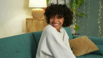 Beautiful African American girl with afro hairstyle smiling. Close up portrait of young happy black girl. Young African woman with curly hair laughing. Freedom happiness carefree happy people concept video