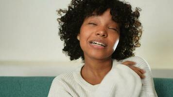 Beautiful African American girl with afro hairstyle smiling. Close up portrait of young happy black girl. Young African woman with curly hair laughing. Freedom happiness carefree happy people concept video