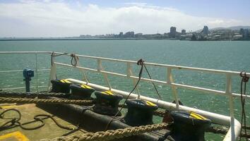 Mooring bollard on the decks of an industrial seaport. photo