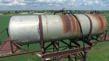 The water tower. An old rustic communal communication. The water tower photo