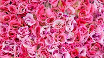 Close up view of pink artificial rose flowers photo