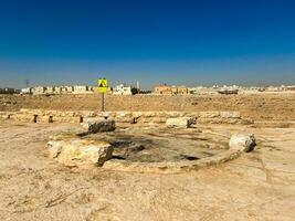 Public barbecue place  in a Wadi namar park riyadh . The stone block allows people to grill food outdoors. Fire place for a BBQ party. photo