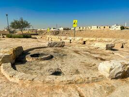 Public barbecue place  in a Wadi namar park riyadh . The stone block allows people to grill food outdoors. Fire place for a BBQ party. photo