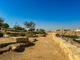 Public barbecue place  in a Wadi namar park riyadh . The stone block allows people to grill food outdoors. Fire place for a BBQ party. photo