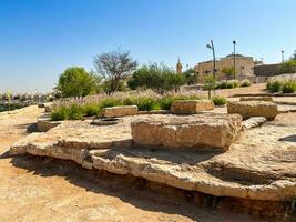 Public barbecue place  in a Wadi namar park riyadh . The stone block allows people to grill food outdoors. Fire place for a BBQ party. photo