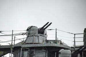 Part of the deck of a warship. communication devices and deck gu photo