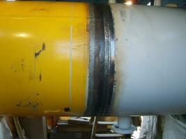 Welding seam on the pipeline photo