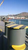 Mooring bollard on the decks of an industrial seaport. photo