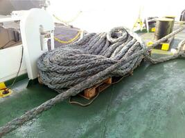 The sea rope on the deck of the ship photo