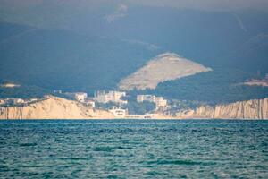 Seascape of the cement bay, Sea and mountains near photo