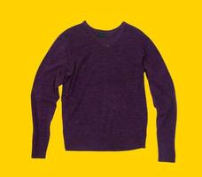 Casual sweater on yellow background photo