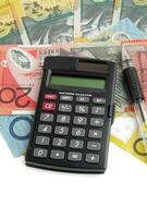 calculator with money photo