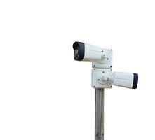 Isolated security camera on white background photo