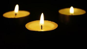 candles closeup in dark photo