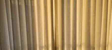 Radiant and welcoming, this sunlit house curtain creates a warm and inviting atmosphere. Purchase this image and illuminate your projects with luminosity and comfort photo