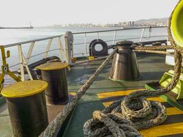 The sea rope on the deck of the ship photo