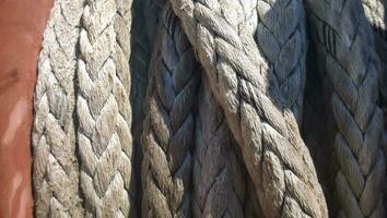 Port rope. Mooring rope. Rope for fastening ships and cargo photo