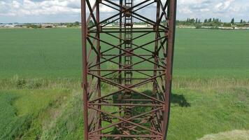 The water tower. An old rustic communal communication. The water tower photo