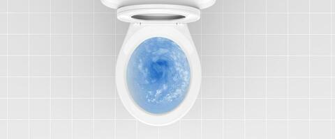 Top view of toilet bowl, blue detergent flushing in it photo