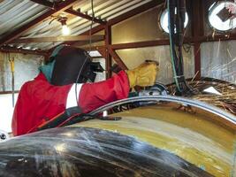 Safety at work. Welding and installation of the pipeline. Indust photo