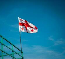 Flag of Georgia waving closeup photo