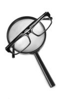 magnifying glass on white photo