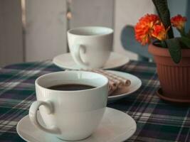 Cups of coffee on the balcony photo